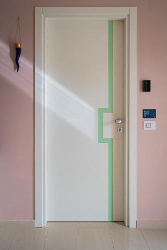 an open door in a room with a wall at Villa Zefiro - Suites & Events in Battipaglia