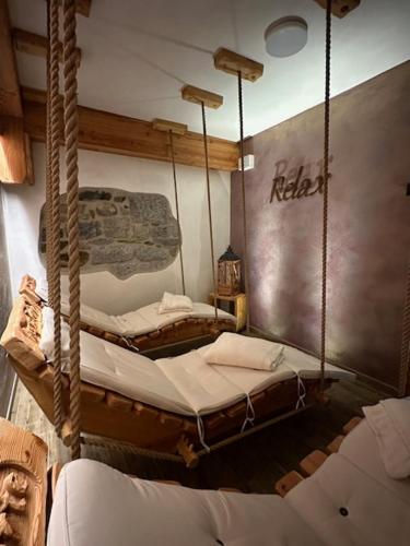 Postel nebo postele na pokoji v ubytování Hotel Ristorante Milano