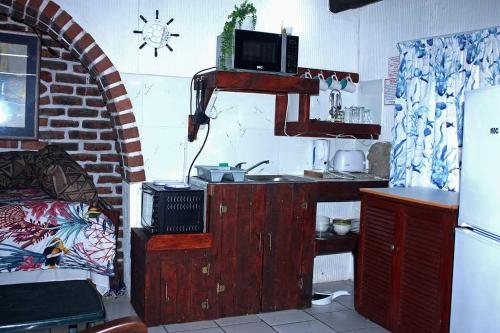 Una cocina o zona de cocina en Unwind in Paradise