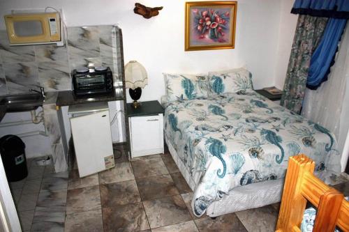 Una cocina o zona de cocina en Unwind in Paradise