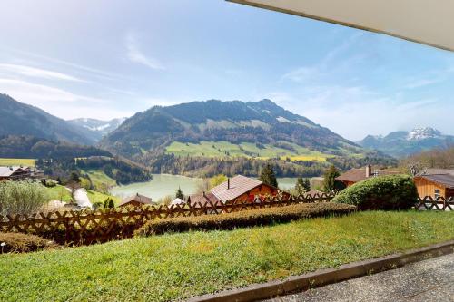 a view of a valley with mountains in the background at Ferienchalet Seeblick in Crésuz