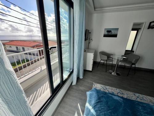 Χώρος καθιστικού στο SCIROCCO SUITES Madeira - Ocean View