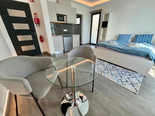 Η κουζίνα ή μικρή κουζίνα στο SCIROCCO SUITES Madeira - Ocean View