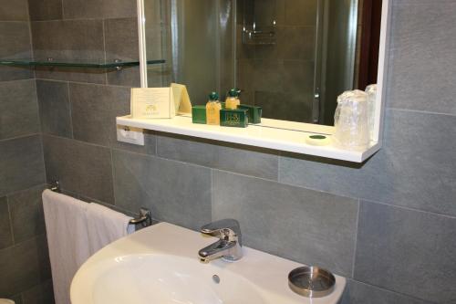 Ένα μπάνιο στο Albergo Residence Italia Vintage Hotel