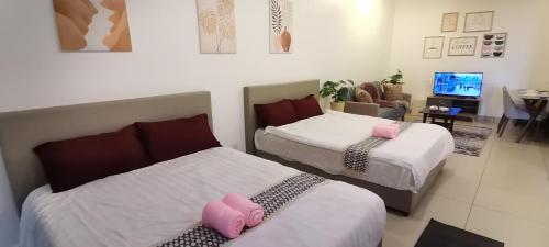Ένα ή περισσότερα κρεβάτια σε δωμάτιο στο LCP T1 Honeymoon genting highland midhill homestay