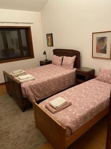 Ένα ή περισσότερα κρεβάτια σε δωμάτιο στο Beach House in prime location!