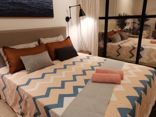 Ένα ή περισσότερα κρεβάτια σε δωμάτιο στο LCP T1 Honeymoon genting highland midhill homestay