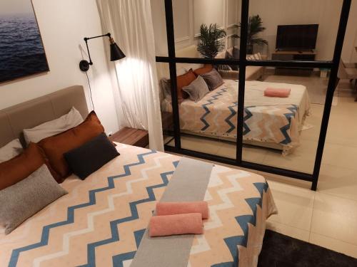 Ένα ή περισσότερα κρεβάτια σε δωμάτιο στο LCP T1 Honeymoon genting highland midhill homestay