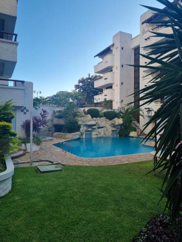 Bazén v ubytování Hotel Condominio Casa Blanca nebo v jeho okolí