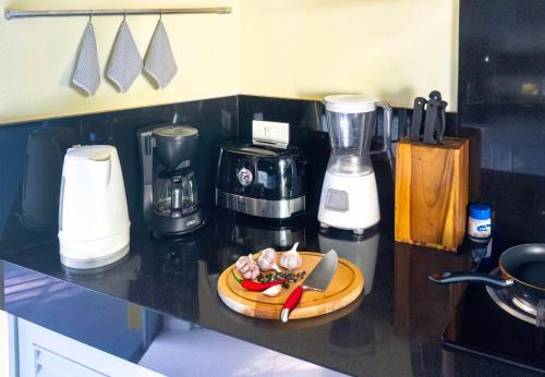 Køkken eller tekøkken på Palm View Villa