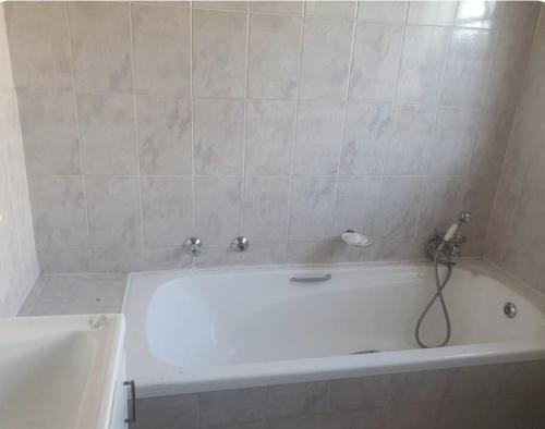 Et badeværelse på Lifestyl Cottage