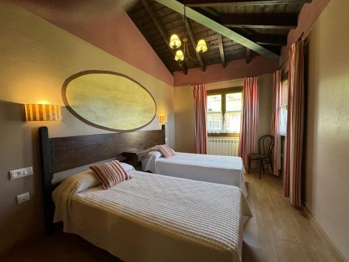 A bed or beds in a room at La Quintana de Villar
