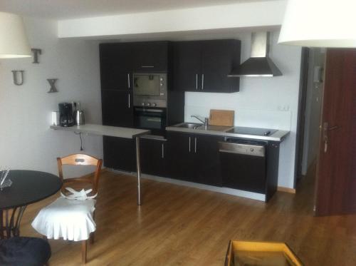 Η κουζίνα ή μικρή κουζίνα στο Villa des Sarcelles