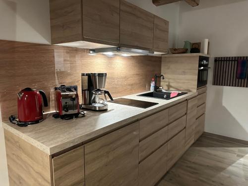 Kuchyň nebo kuchyňský kout v ubytování Kiefer -Ferienwohnung in Dötlingen mit Waldblick
