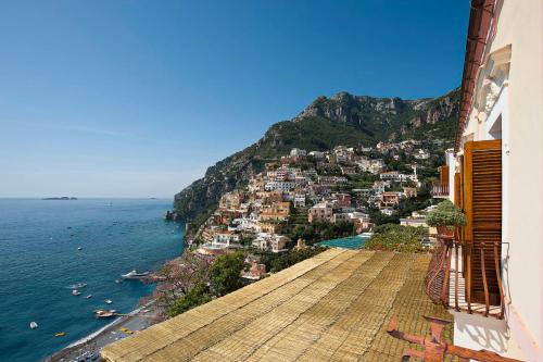 a view of the amalfi coast from a building at Albergo California in Positano