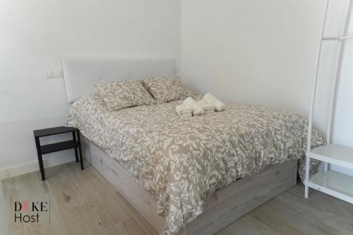 Katil atau katil-katil dalam bilik di Casa de Huéspedes Carabanchel1