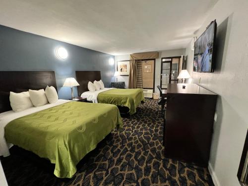 Postel nebo postele na pokoji v ubytování Quality Inn Indianola