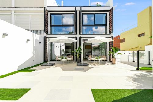 Façade ou entrée de l'établissement La Vega de Ciudad Jardín Suites