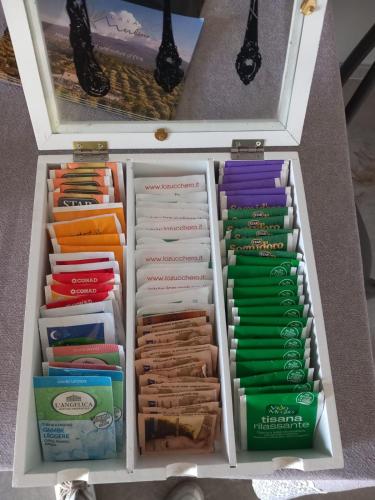 a drawer full of different colored pens and pencils at Il Calice dell'Etna in Passopisciaro