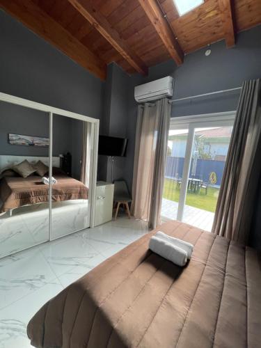 Postel nebo postele na pokoji v ubytování Alma Suite Bed and Breakfast