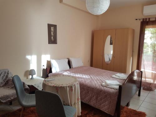 Ένα ή περισσότερα κρεβάτια σε δωμάτιο στο Studio in Perama