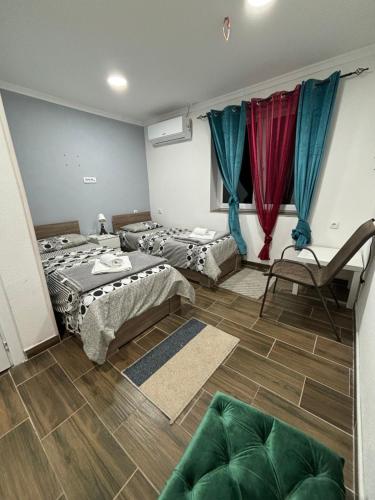 Postel nebo postele na pokoji v ubytování Gas Otel