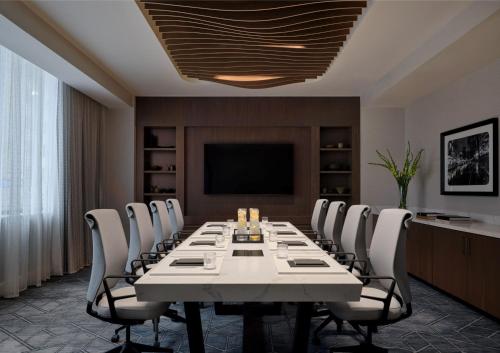 a conference room with a long table and chairs at InterContinental San Antonio Riverwalk by IHG in San Antonio