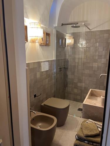 Ванная комната в Dimora Cocchi in Corte