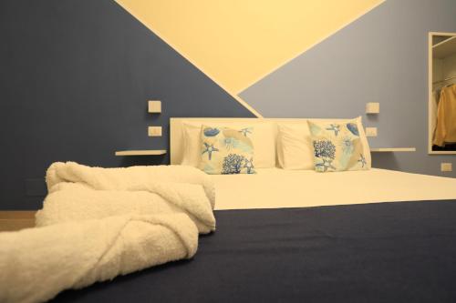A bed or beds in a room at Casa Onofrio Tropea