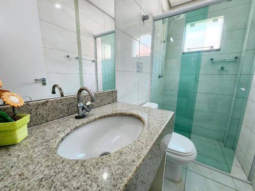 Koupelna v ubytování 101- Apartamento em Bombas