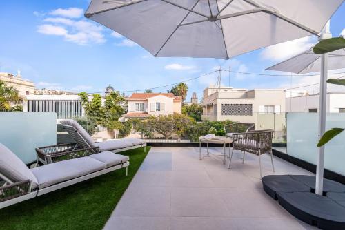 Balcon ou terrasse dans l'établissement La Vega de Ciudad Jardín Suites
