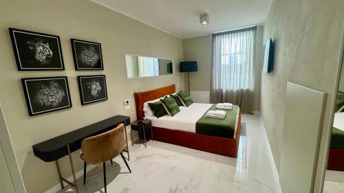 Letto o letti in una camera di La CHARTREUSE Luxury Suites