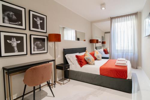 Letto o letti in una camera di La CHARTREUSE Luxury Suites