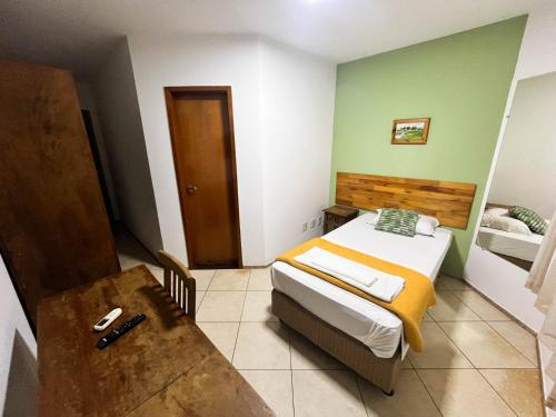 Ένα ή περισσότερα κρεβάτια σε δωμάτιο στο Hotel Catavento