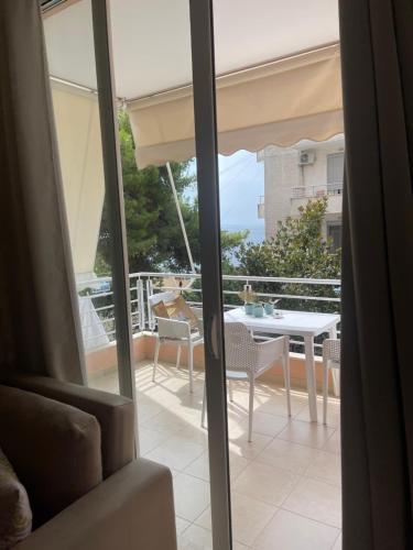 Posezení v ubytování Saranda Aquamarine Sea View Condo
