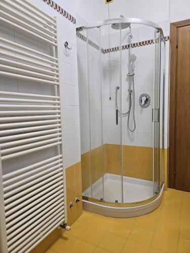 a shower with a glass door in a bathroom at MMM HOME Train Station 3 in Mestre