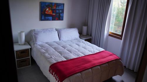 Postel nebo postele na pokoji v ubytování Apart Finiterra