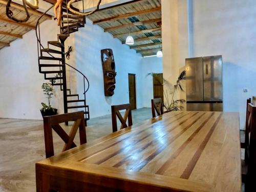 Η κουζίνα ή μικρή κουζίνα στο Appartement YLANG