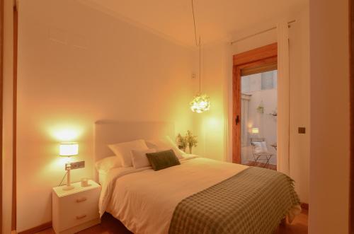 Postel nebo postele na pokoji v ubytování Apartamentos San Pedro