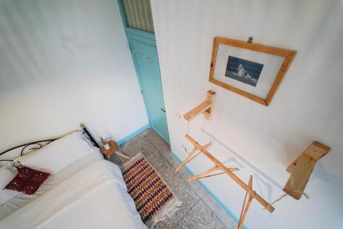 a living room with a couch and a picture on the wall at Anza sets house in Agadir