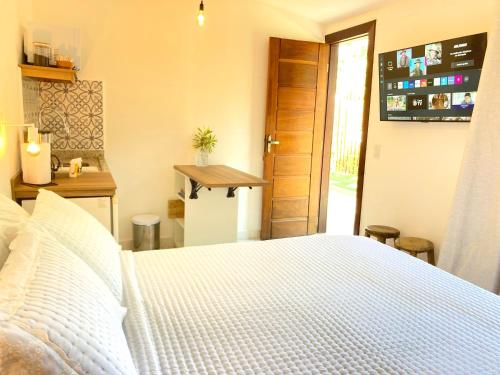 Postel nebo postele na pokoji v ubytování Meu Quintal Suítes - Búzios