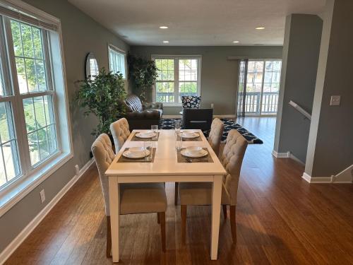a dining room with a table and chairs at Dupont4 Oasis in Minneapolis