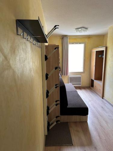 Ένα ή περισσότερα κρεβάτια σε δωμάτιο στο cosy appt 6 beds dans residence MMV