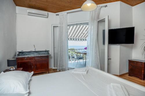 Postel nebo postele na pokoji v ubytování Apartments Milica