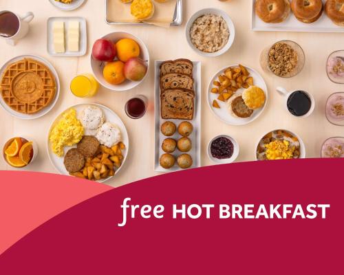 a table filled with different types of breakfast foods at Drury Inn & Suites Columbus Dublin in Dublin