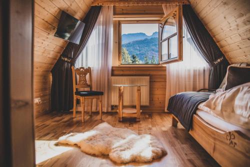 Postel nebo postele na pokoji v ubytování TatryTop Dom Krzeptówki Zakopane