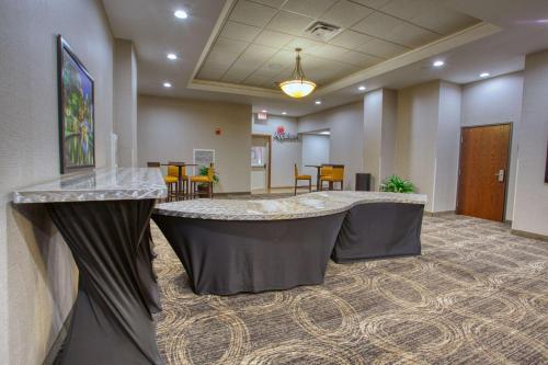 a meeting room with a large table in the middle at Drury Inn & Suites San Antonio Near La Cantera in San Antonio