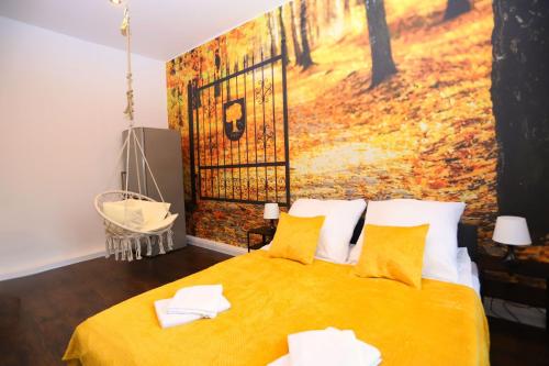 Una cama o camas en una habitación de Pokoje z widokiem na wieże