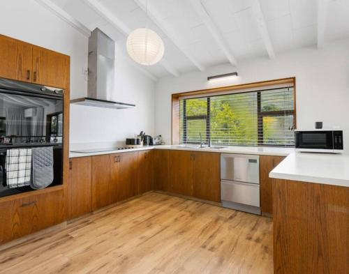 Kuchyň nebo kuchyňský kout v ubytování Peakview Lodge Wanaka