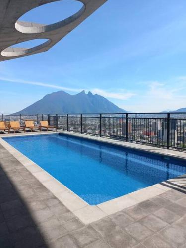 a swimming pool on top of a building at Premier Monterrey Retreat 5 in Monterrey